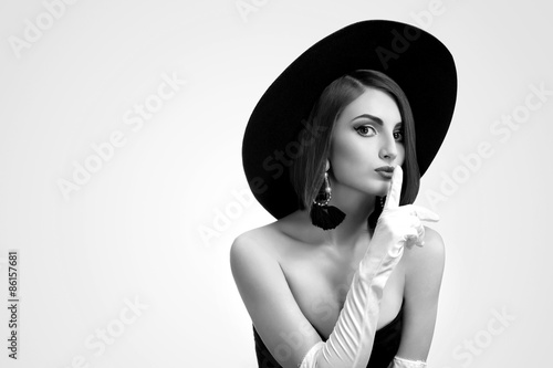 black and white portrait of a beautiful young woman with a bob h