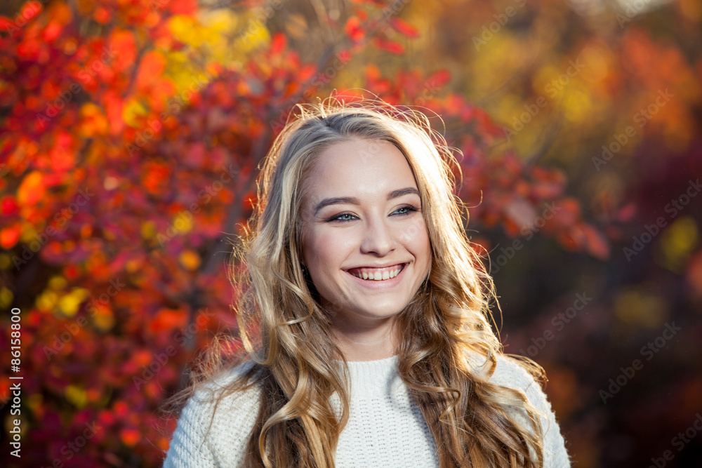 beautiful young woman with curly hair against a background of beautiful young woman with curly hair against a background of