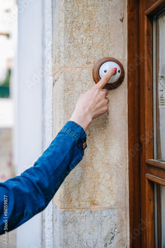 Girl rings the doorbell