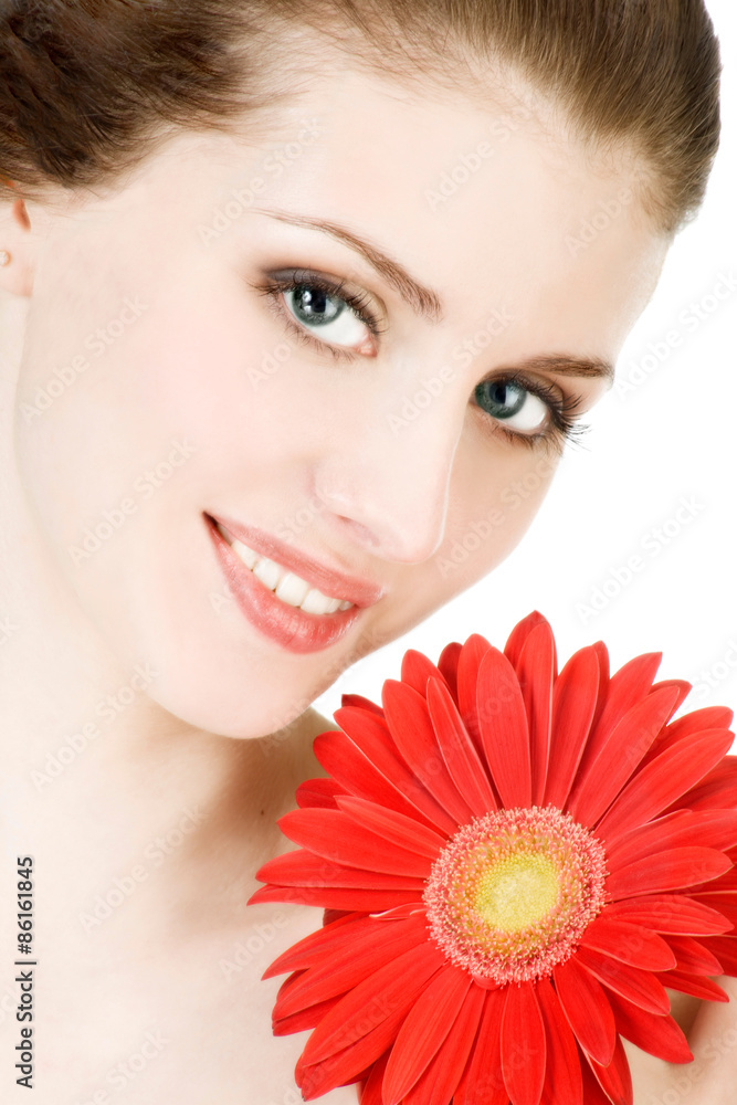 Beautiful female face with gerbera Beautiful female face with gerbera