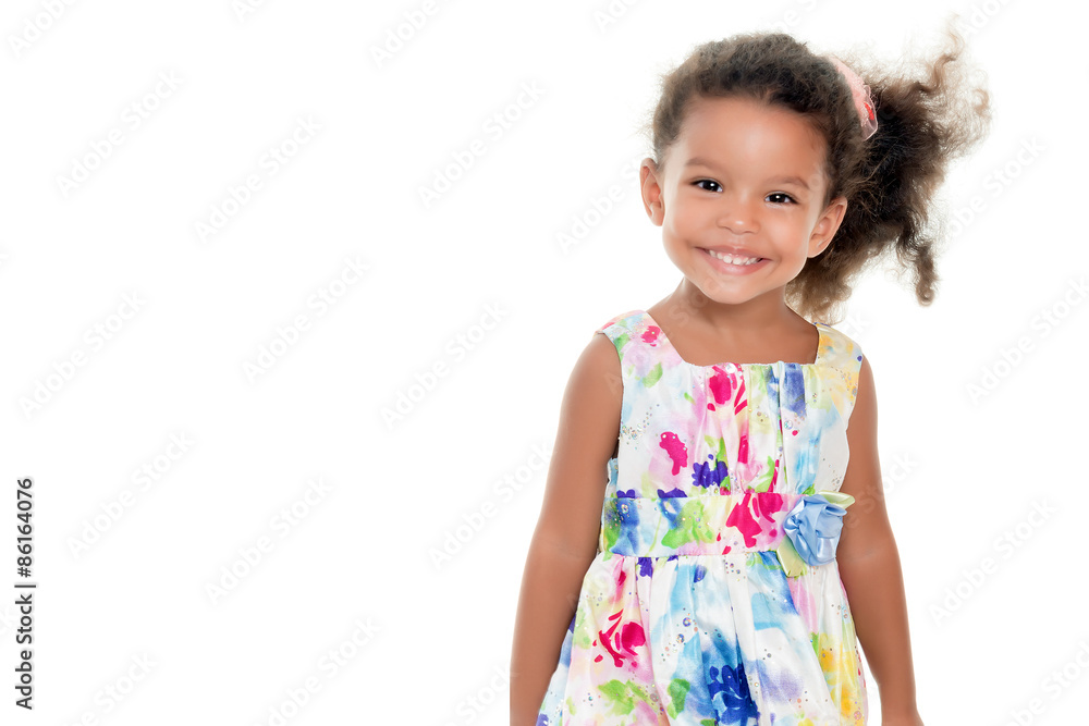 Cute small girl wearing a flowers summer dress Cute small girl wearing a flowers summer dress