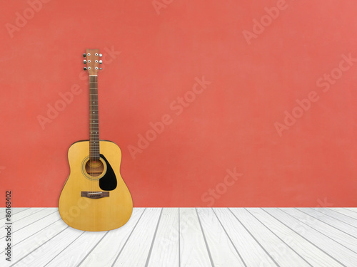 Guitar in blank empty room