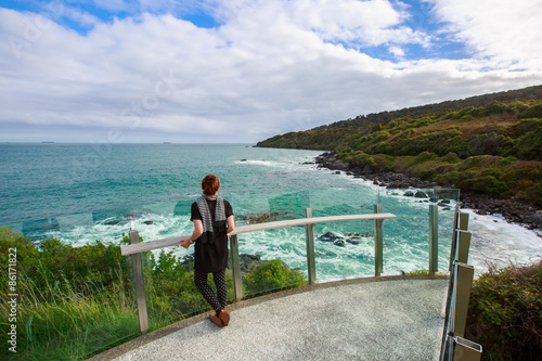 Woman enjoys the view at the view point at Bluff, South Island, © naruedom