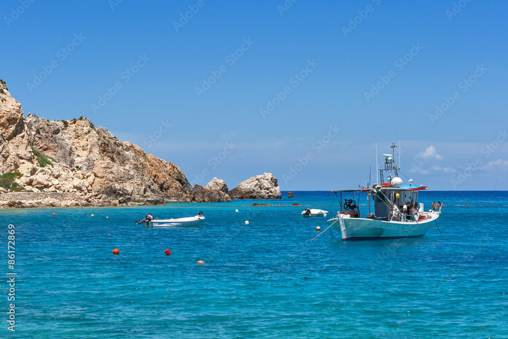 Small Boat in the Blue waters of Ionian sea, near Agios Nikitas village, lefkada