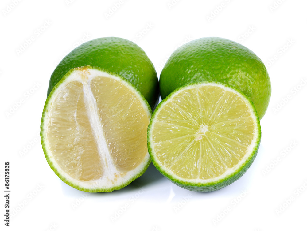 Limes with half isolated on white background Limes with half isolated on white background