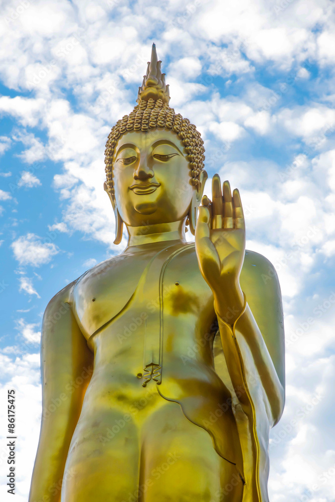 Golden Buddha statue  over blue sky,Tak,Thailand