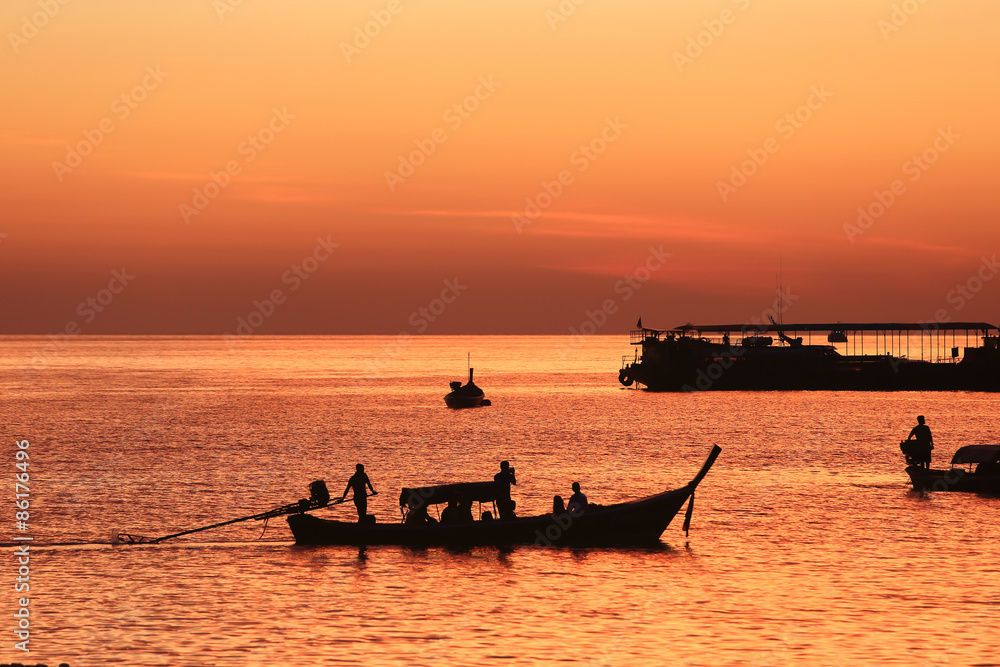 long tail boats at sunset at Koh Lipe
