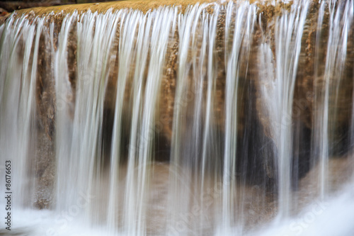 Waterfall and green stream in the forest Thailand