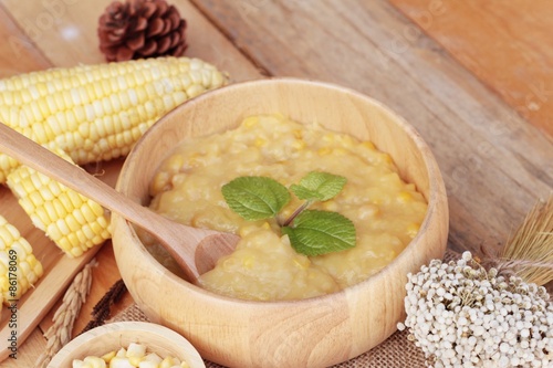 Corn soup of condensed in a wooden bowl