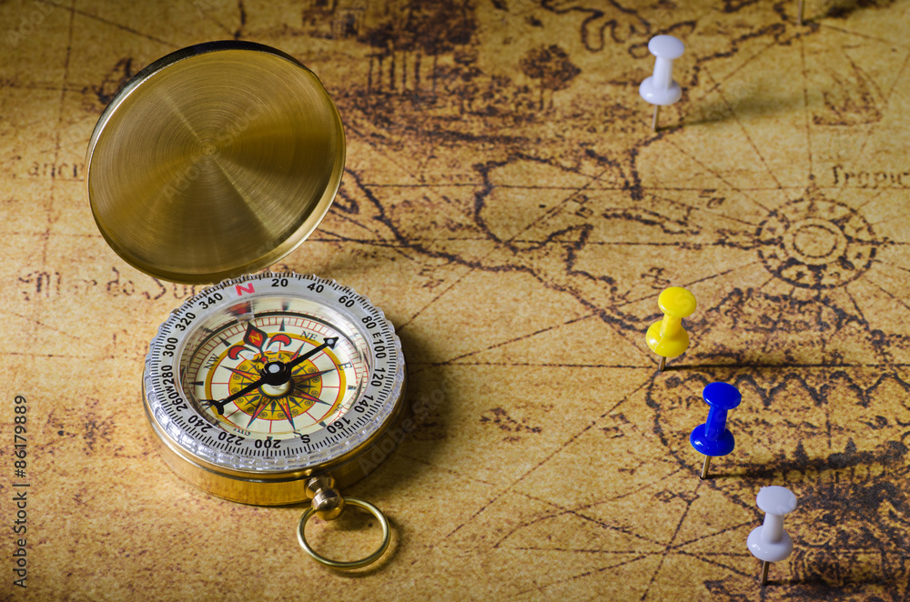 compass with marked location on old map compass with marked location on old map