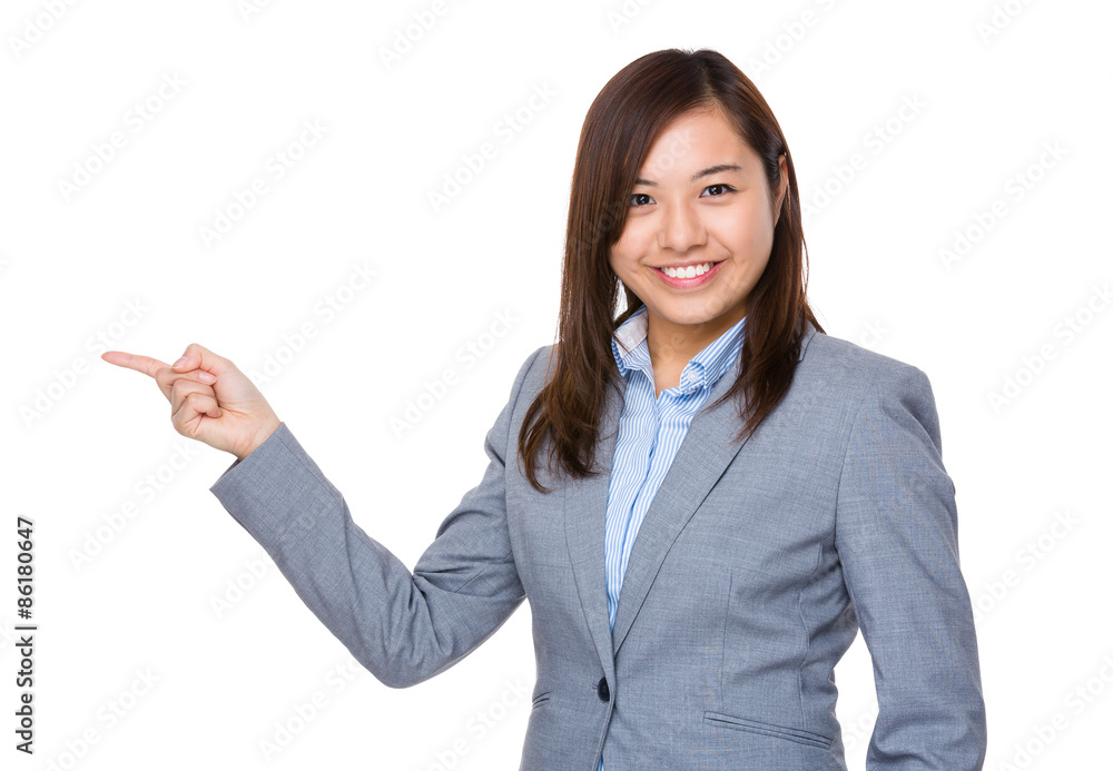 Young businesswoman with finger point up Young businesswoman with finger point up