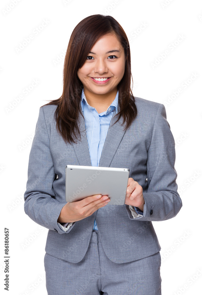 Asian businesswoman use of the digital tablet Asian businesswoman use of the digital tablet