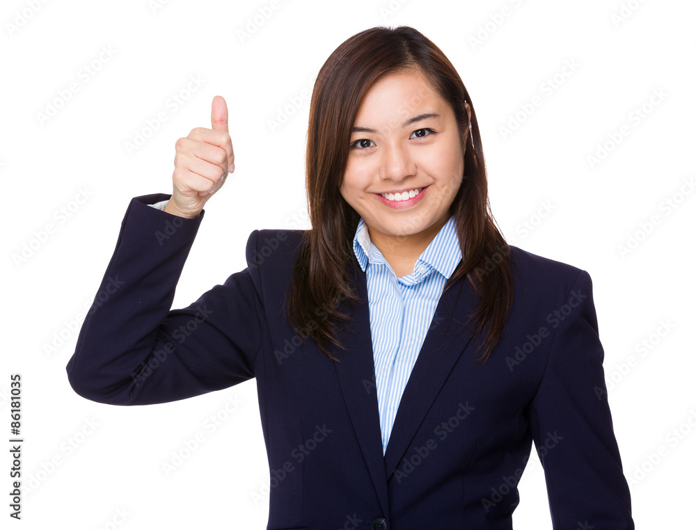 Young businesswoman with thumb up gesture Young businesswoman with thumb up gesture