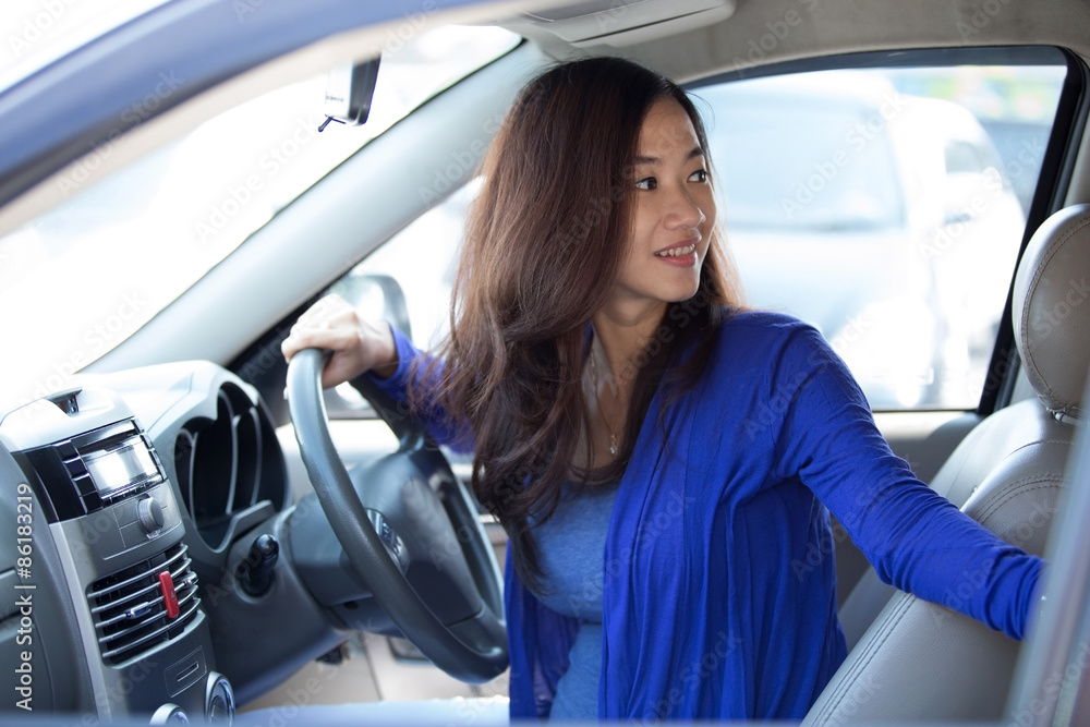 Young Asian woman on ride, a car. Young Asian woman on ride, a car.