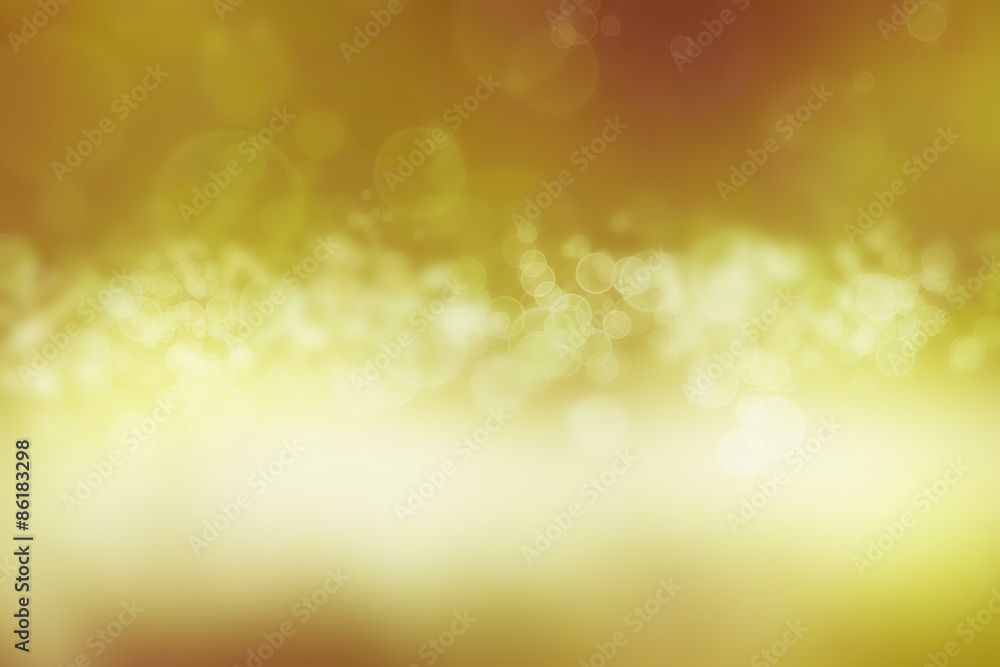 Golden yellow abstract blurred bokeh lights Christmas New Year background