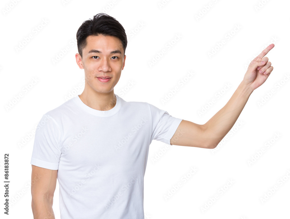 Asian young man with finger point up Asian young man with finger point up