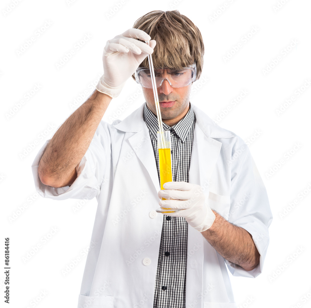 Scientist analyzing a test-tube Scientist analyzing a test-tube