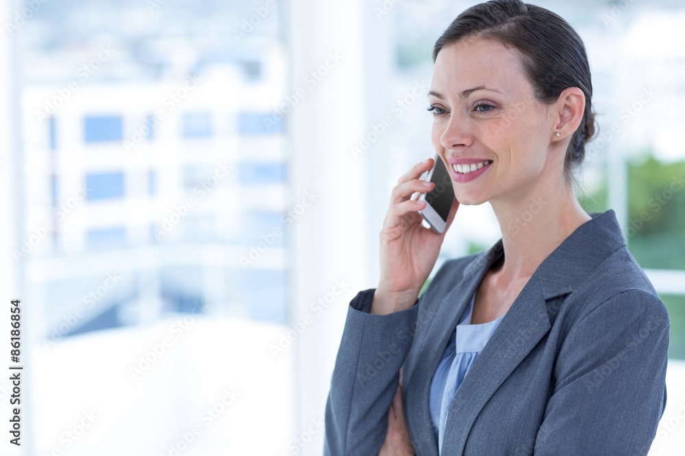 businesswoman using her phone businesswoman using her phone
