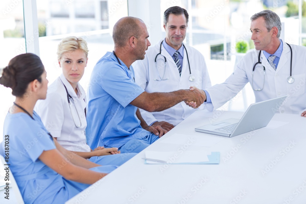 Doctors doing hands shakes Doctors doing hands shakes