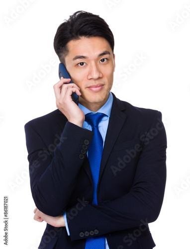 Asian businessman talk to cellphone