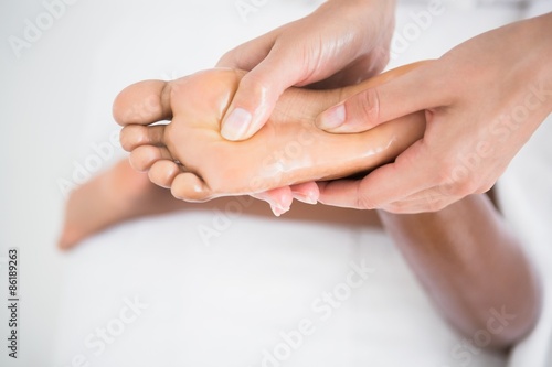 Pretty woman enjoying a foot massage