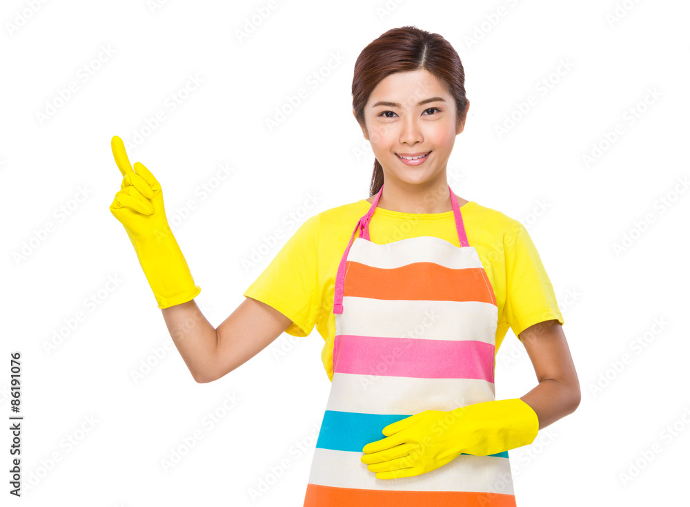 Housewife with plastic gloves and finger point up Housewife with plastic gloves and finger point up