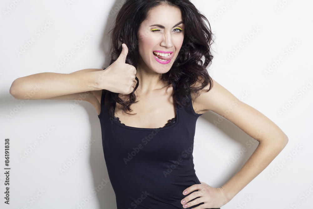 Young beautiful woman showing hand ok sign Young beautiful woman showing hand ok sign