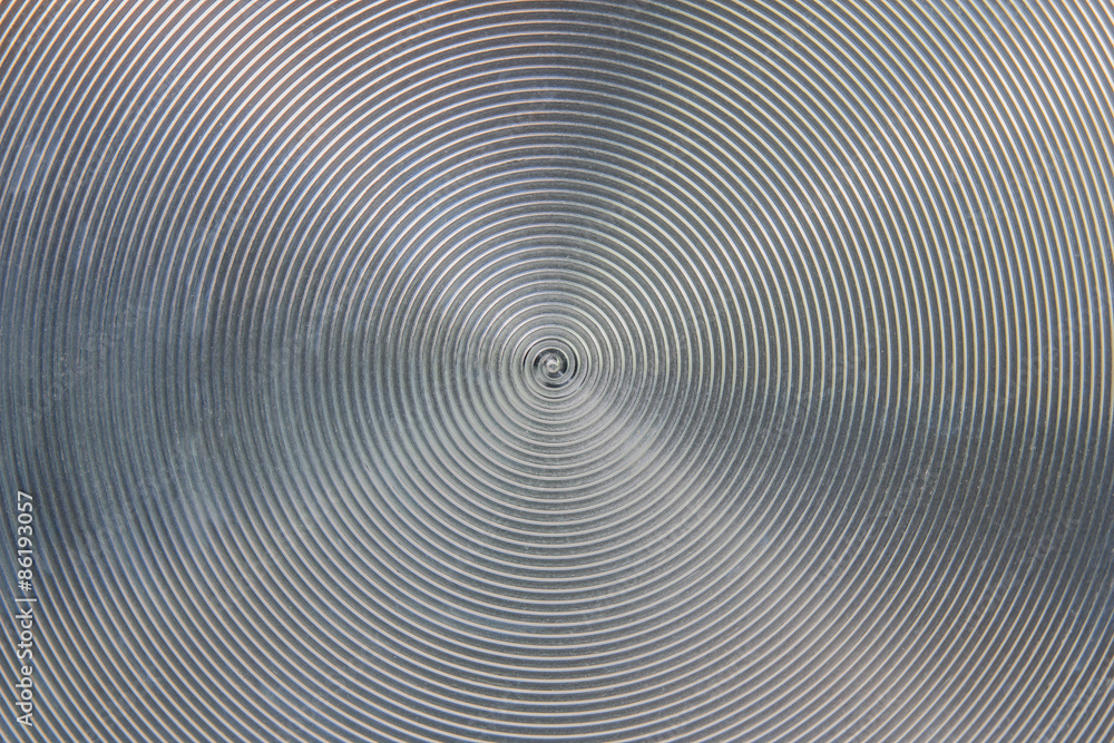 Spiral Pattern From the Bottom of a Cooking Pot Patterned Background. Spiral Pattern From the Bottom of a Cooking Pot Patterned Background.