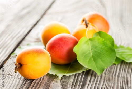 Bright ripe juicy apricots photo