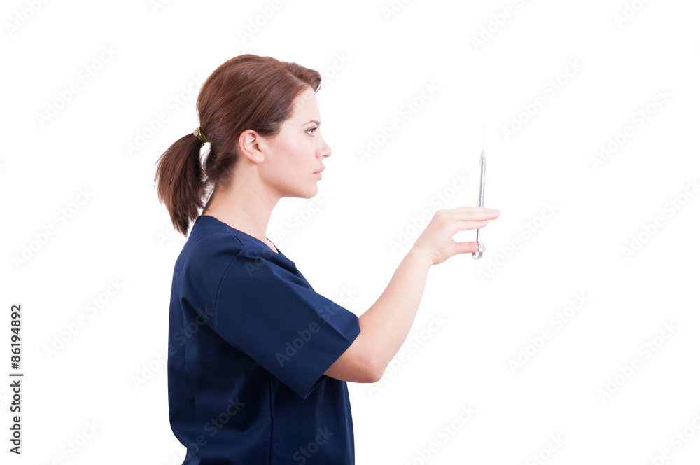 Dentist doctor preparing syringe with anesthetic Dentist doctor preparing syringe with anesthetic