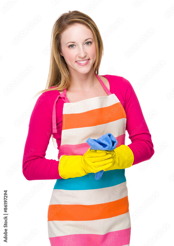 Young woman with plastic gloves and rag Young woman with plastic gloves and rag