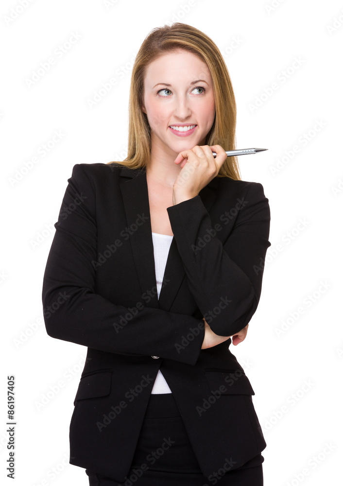 Young businesswoman think of an idea with holding a pen Young businesswoman think of an idea with holding a pen