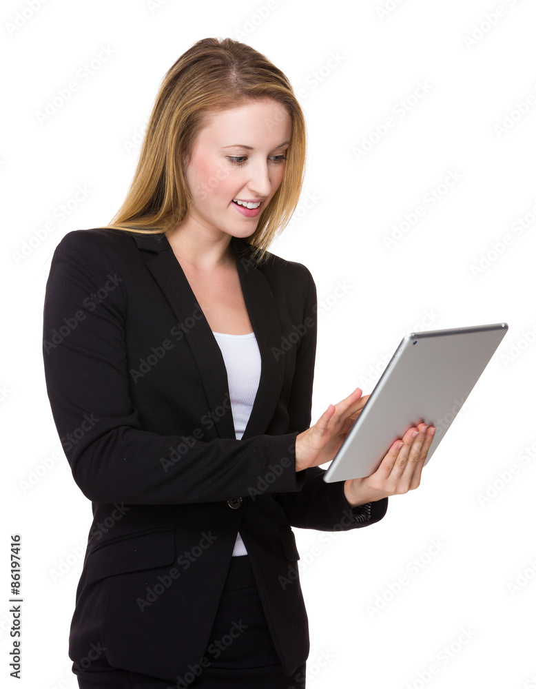Caucasian businesswoman use of the tablet pc Caucasian businesswoman use of the tablet pc