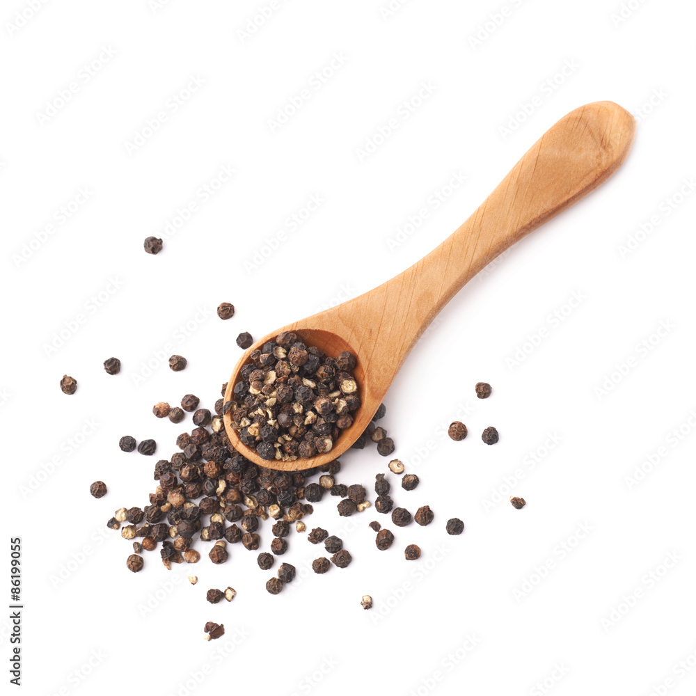 Wooden spoon and black peppercorn Wooden spoon and black peppercorn