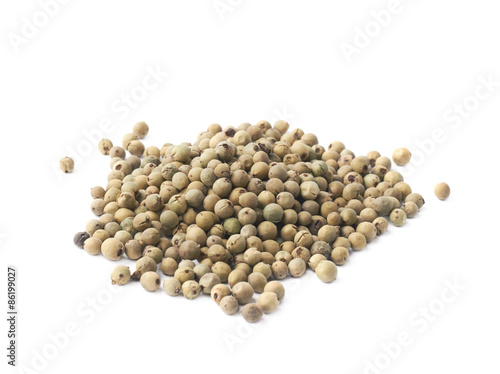 Pile of green peppercorn isolated