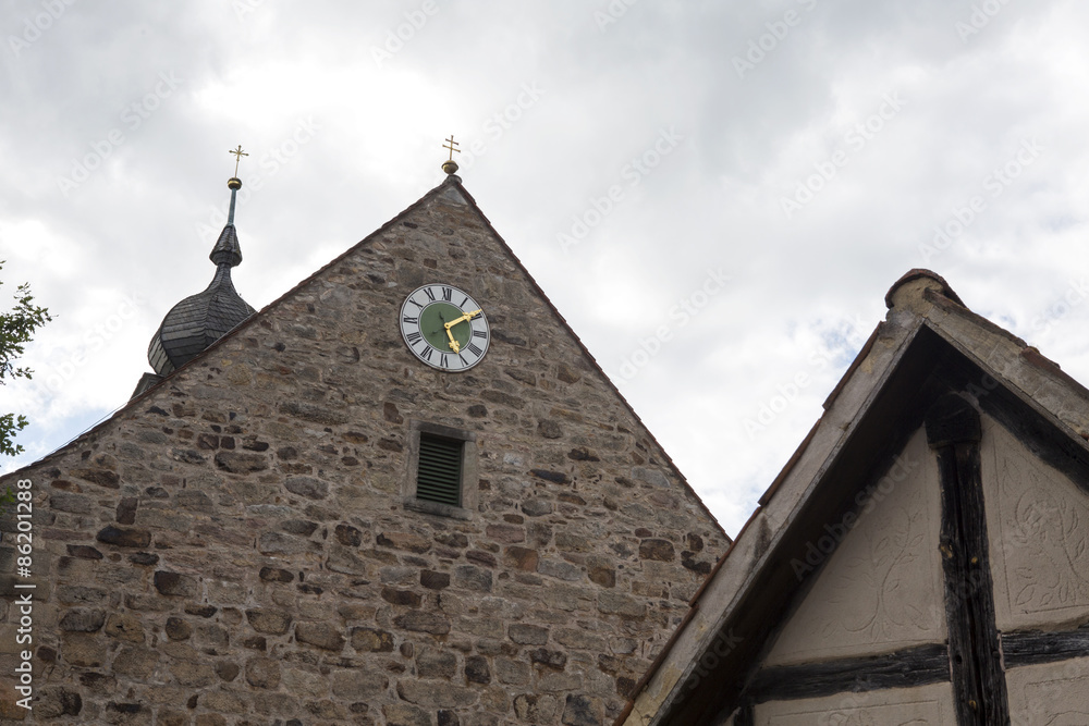 clock on the wall of a church