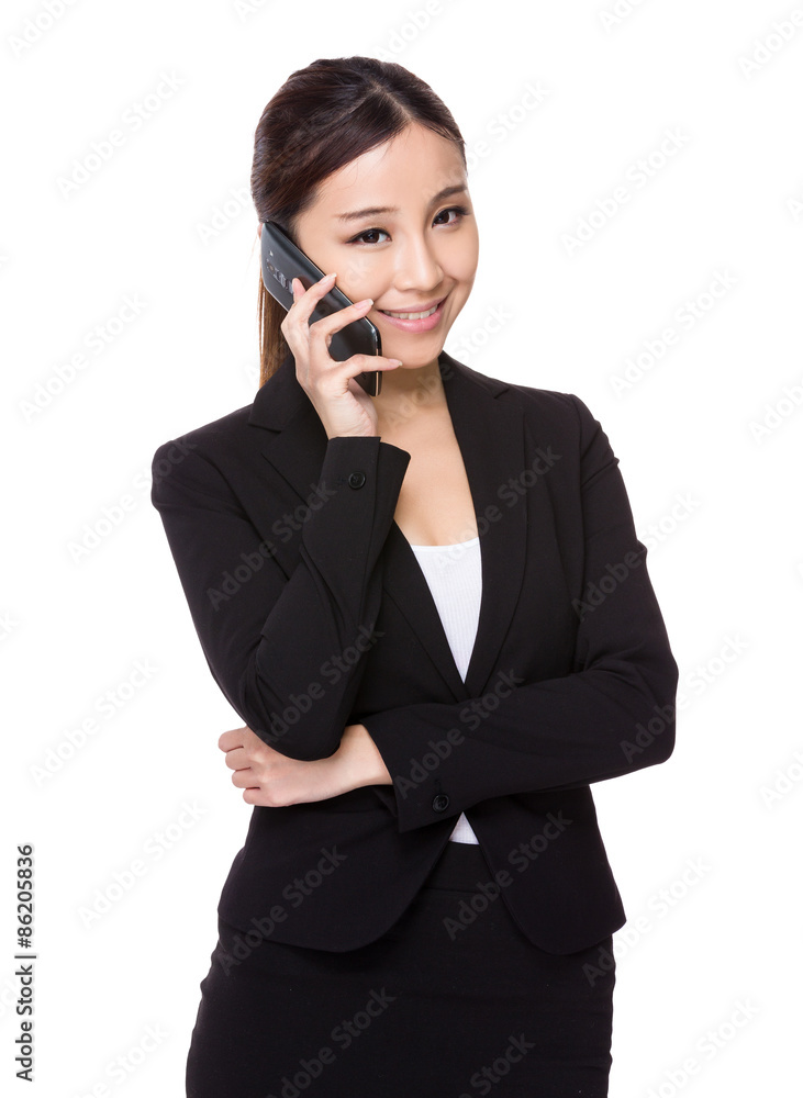 Asian businesswoman talk to cellphone Asian businesswoman talk to cellphone