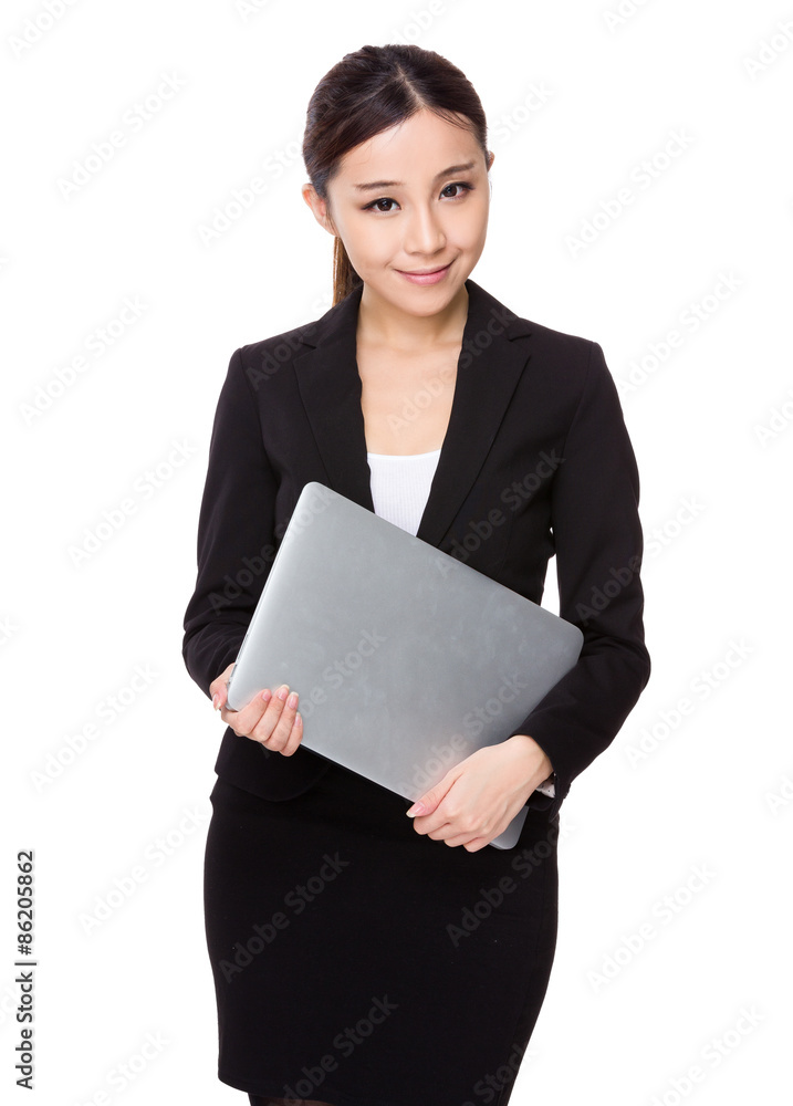 Asian businesswoman hold with notebook computer Asian businesswoman hold with notebook computer
