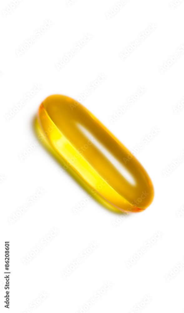 Fish oil pill isolated vertical Fish oil pill isolated vertical