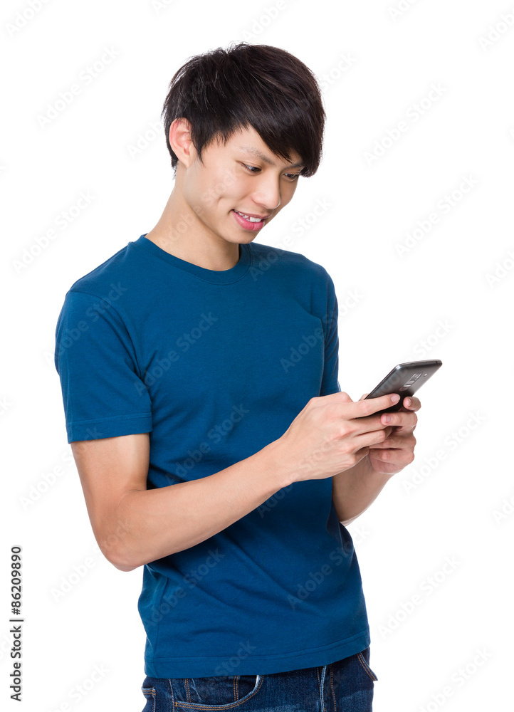 Young man use of the smartphone for checking email Young man use of the smartphone for checking email
