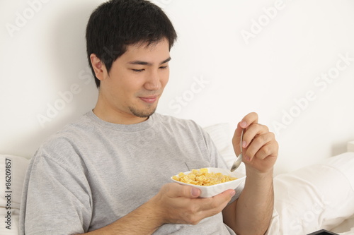 Man eating cereals