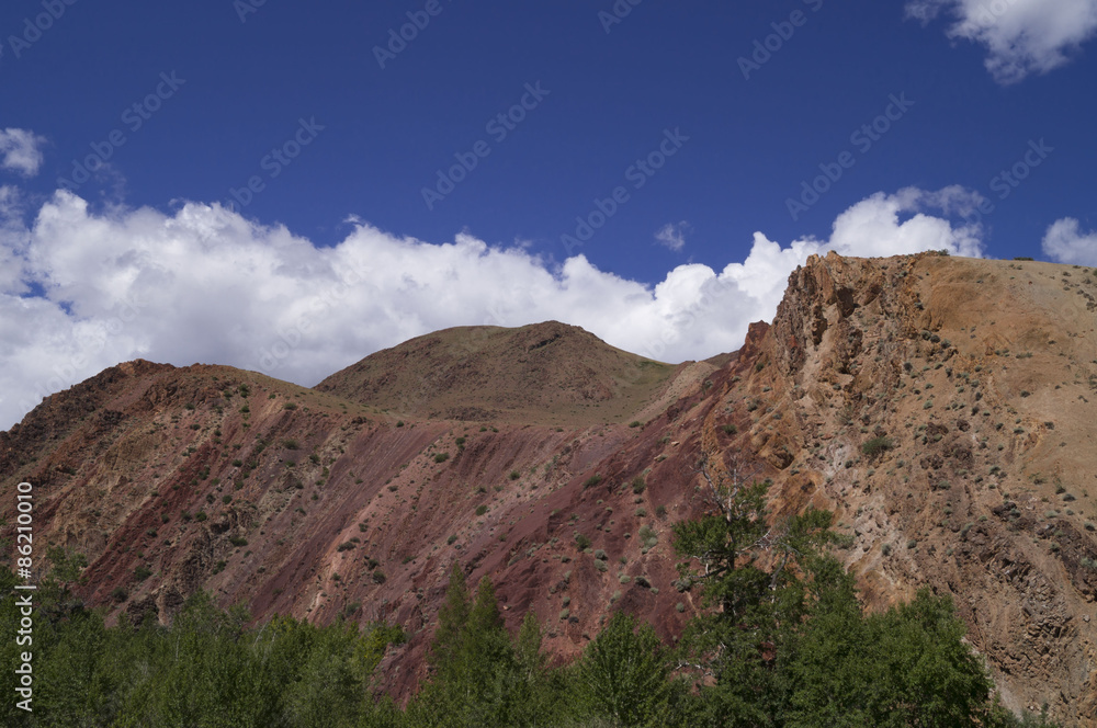 red mountain on the background of blue sky
