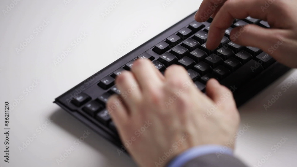 close up of businessman hands typing on keyboard close up of businessman hands typing on keyboard