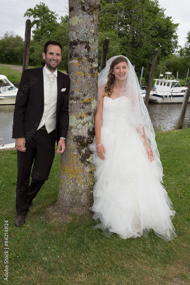 Lovely and young wedding couple happy to be together Lovely and young wedding couple happy to be together