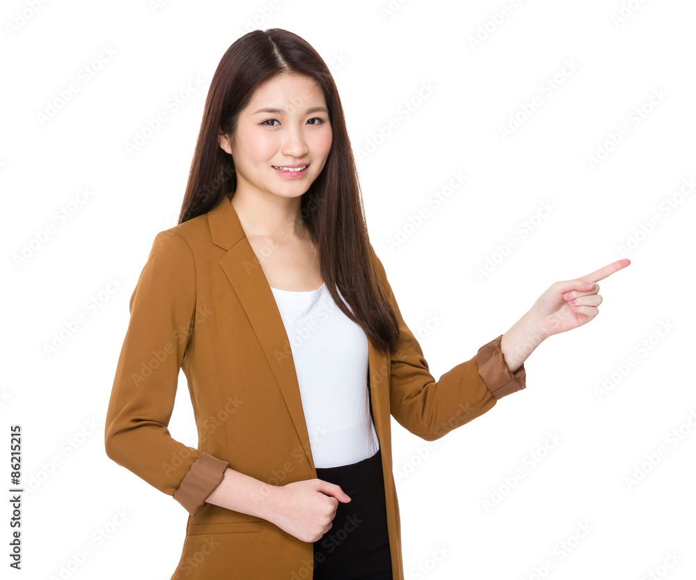 Businesswoman finger point aside for selling product Businesswoman finger point aside for selling product