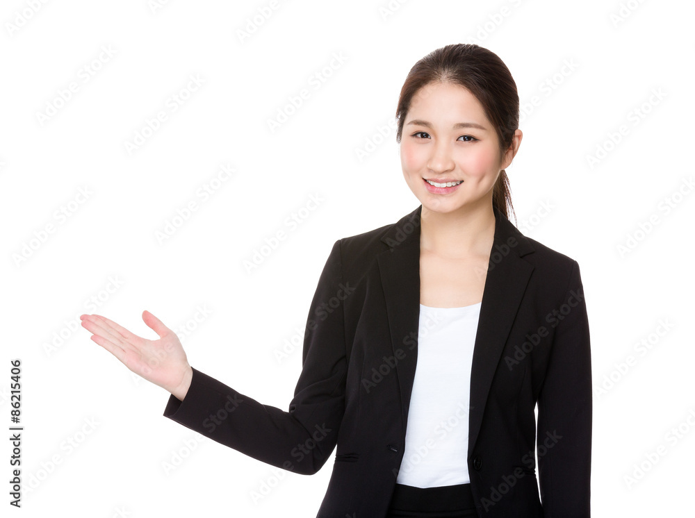 Asian young businesswoman with hand showing something Asian young businesswoman with hand showing something