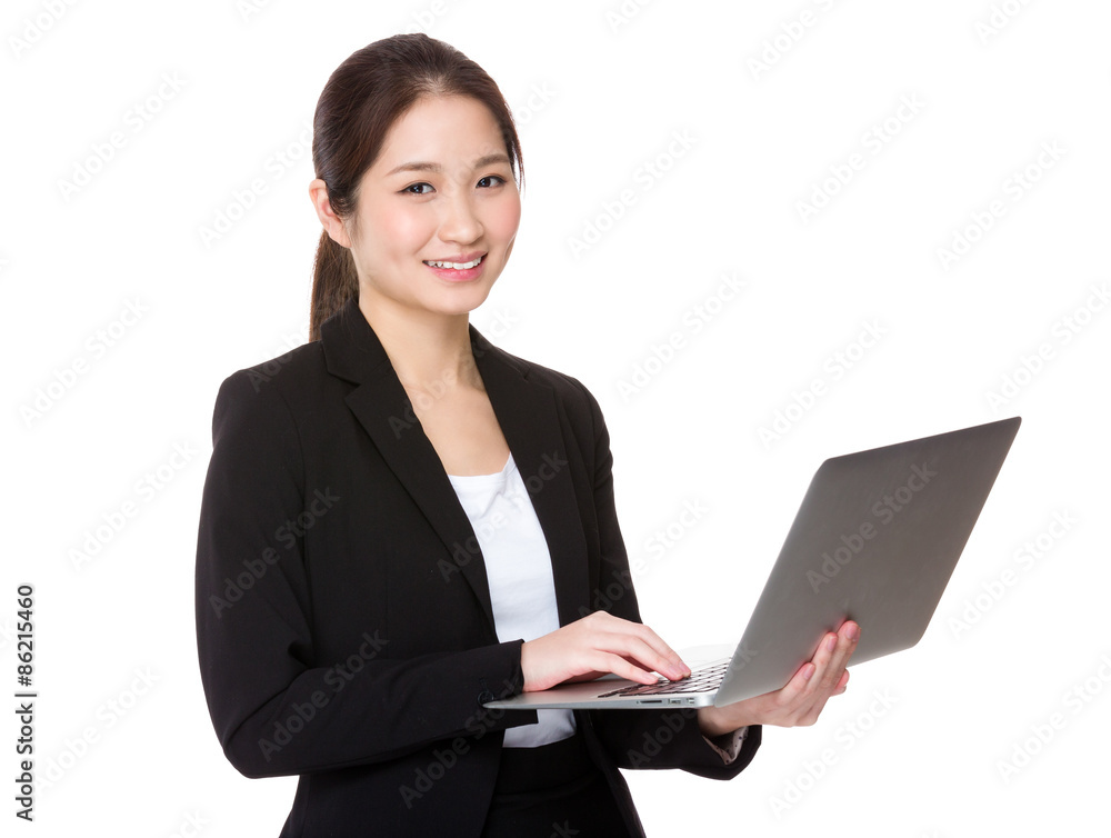 Young businesswoman use of the notebook computer Young businesswoman use of the notebook computer