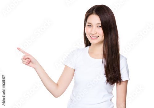 Asian young woman with finger point up