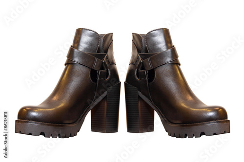 Black high-heeled womanish boots taken closeup.Isolated.