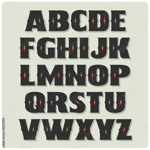 Bold gothic font with red diamonds